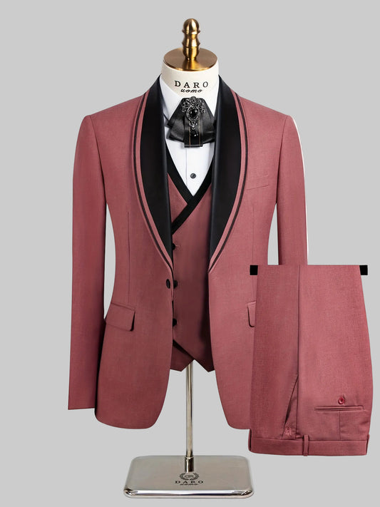 A maroon suit with black lapels on a mannequin