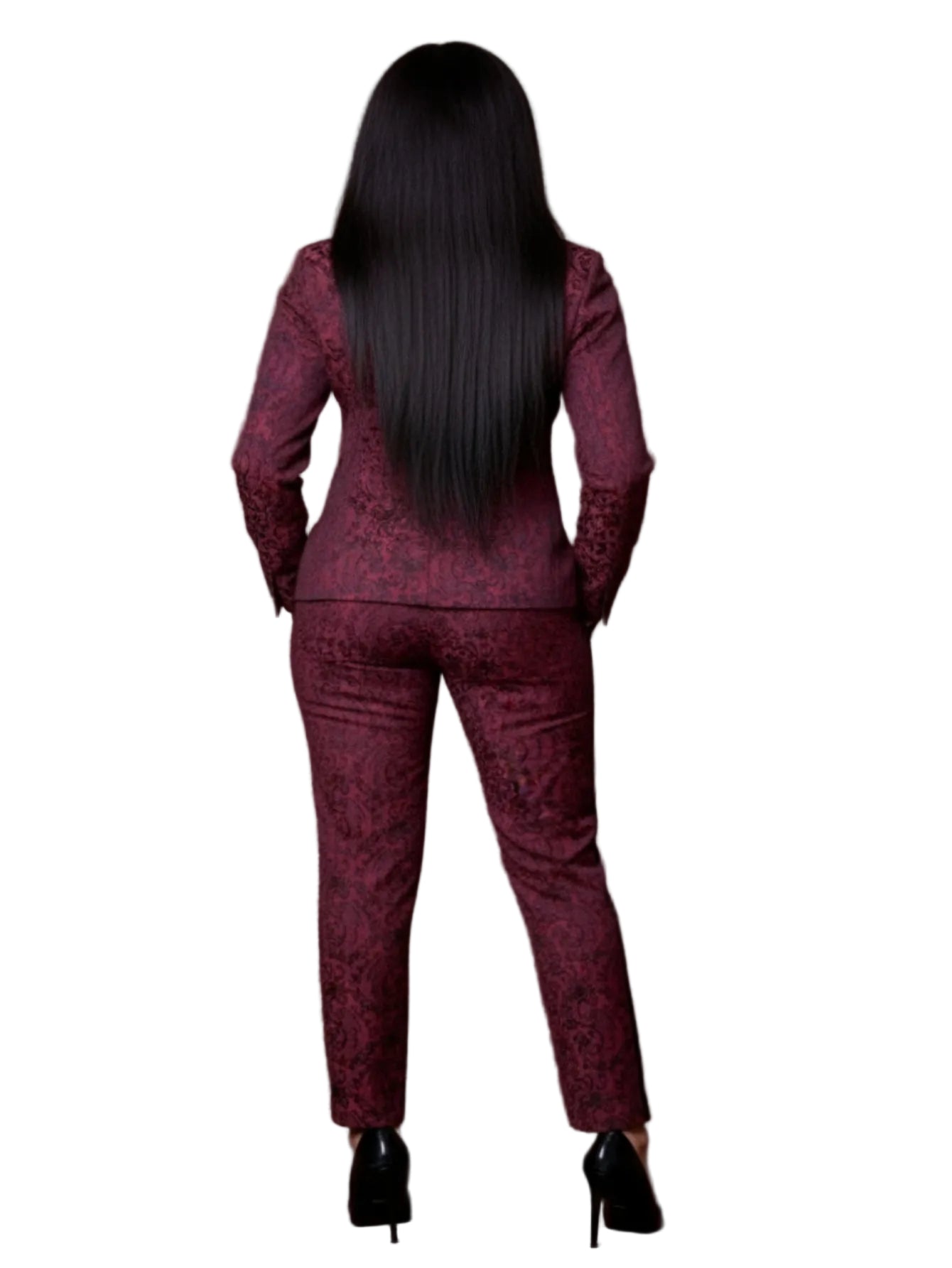 Woman wearing a maroon patterned suit against a brown background