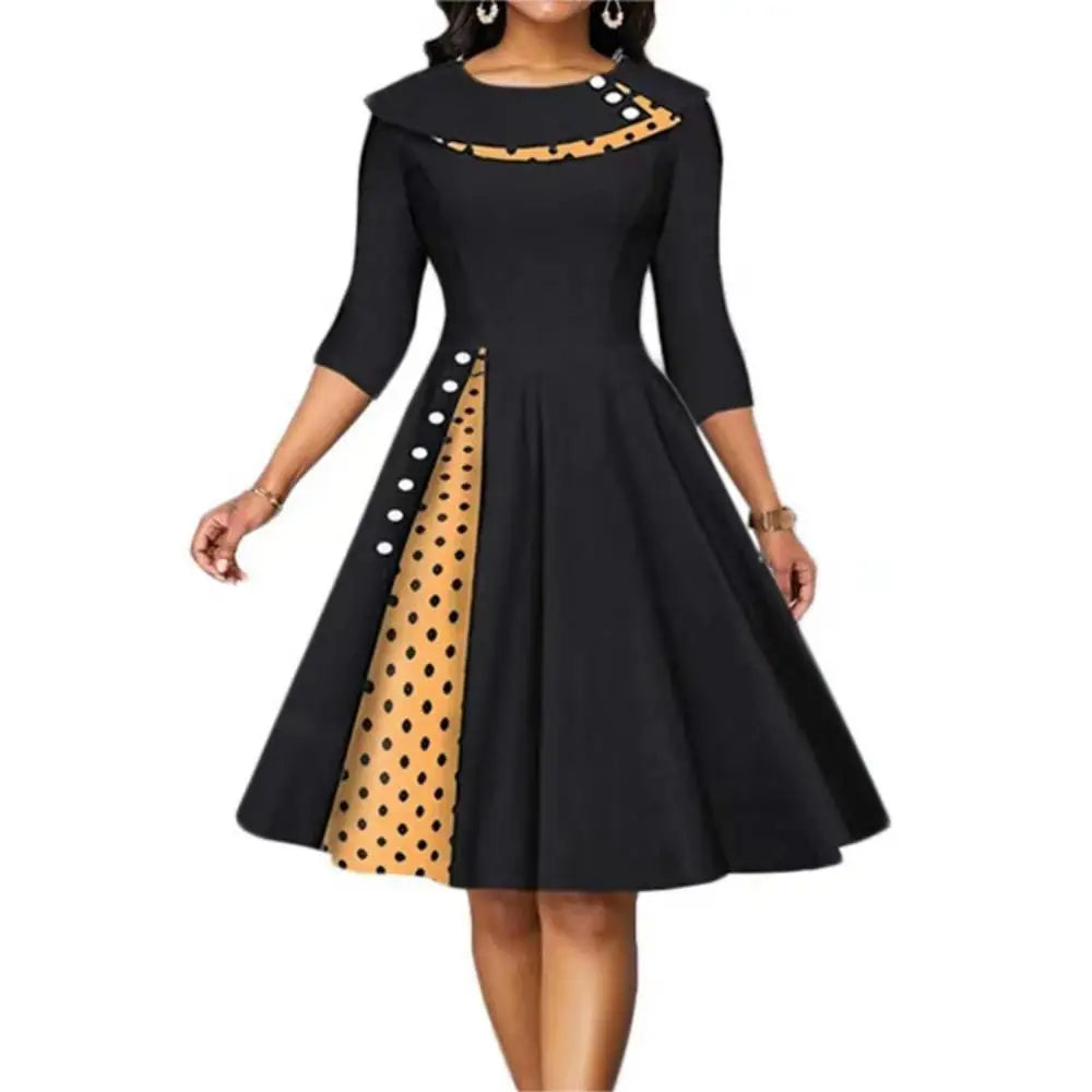 Women's black vintage swing dress with mustard-yellow polka dot side panel and white buttons