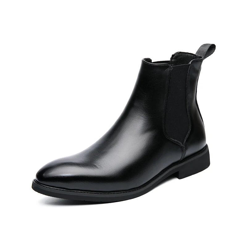 Black leather Chelsea boot on a white background
