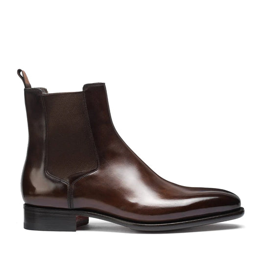 Brown leather Chelsea boot on a white background