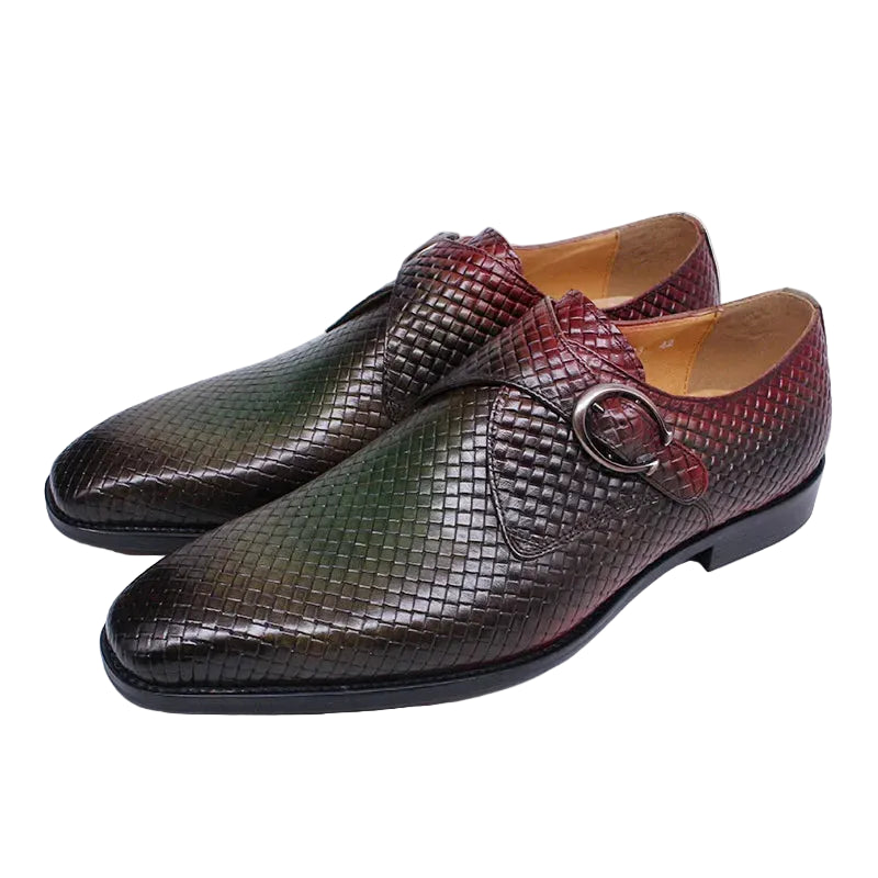 Pair of brown textured dress shoes with a buckle on a white background, featuring the brand 'Daniel Wafer'.