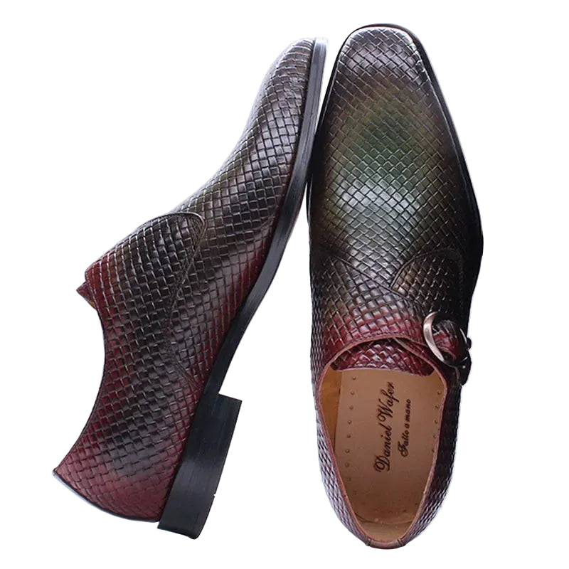 Brown textured dress shoes with a box on a white background, featuring the brand 'Daniel Wafer'.