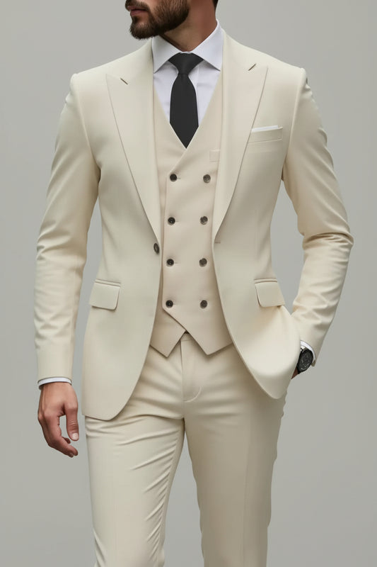 Man wearing a beige suit with a tie on a city street