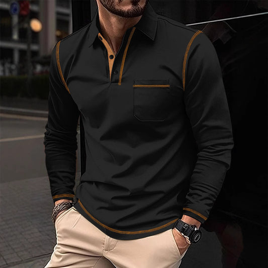 Man wearing a black long-sleeve shirt with brown accents on a blurred street background