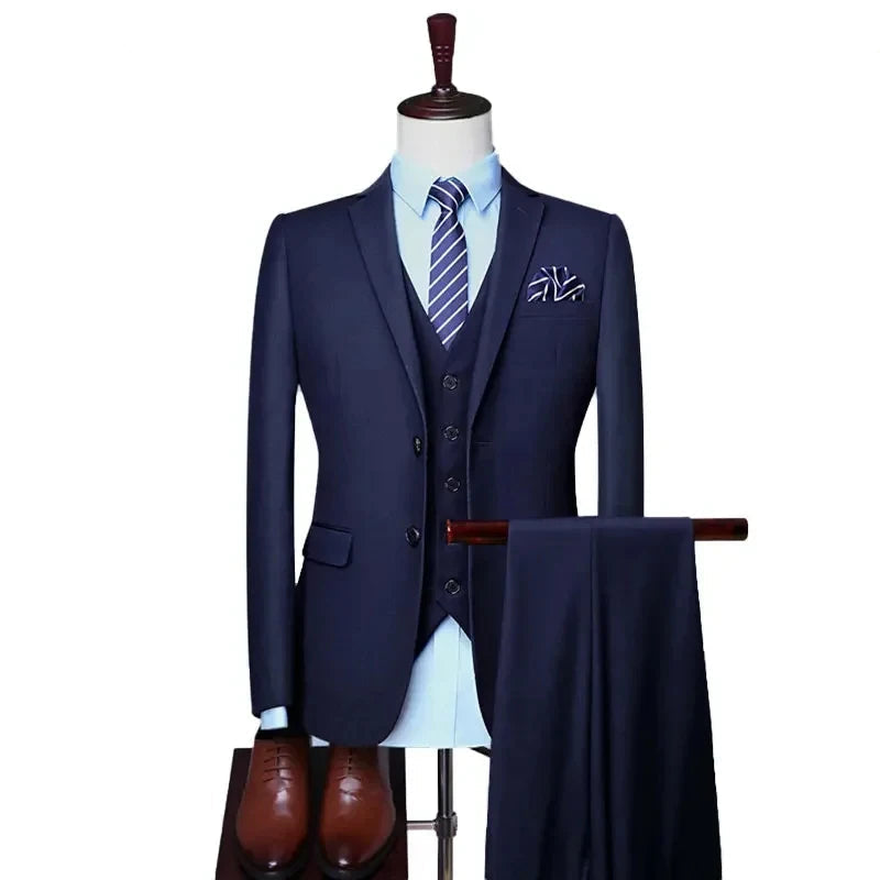 Navy blue suit with a tie on a mannequin against a white background
