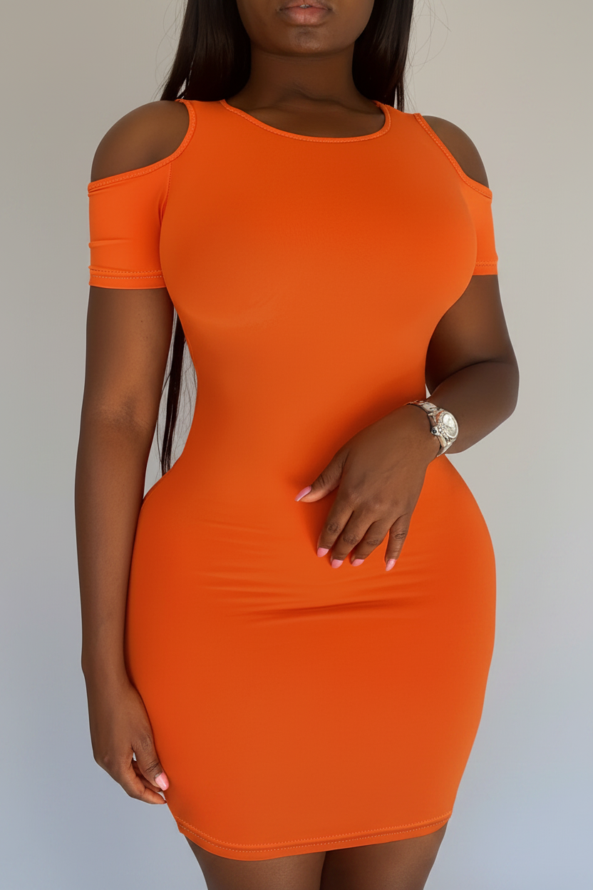 Orange dress with shoulder cutouts worn by a model against a plain background