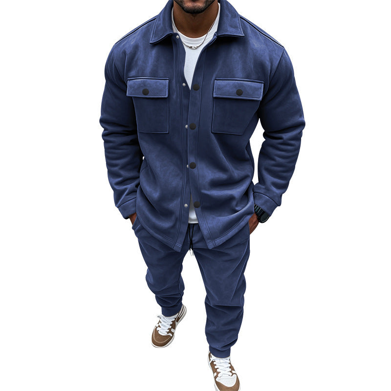 Person wearing a blue outfit with a jacket and pants on a white background