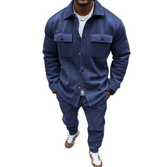 Person wearing a blue outfit with a jacket and pants on a white background