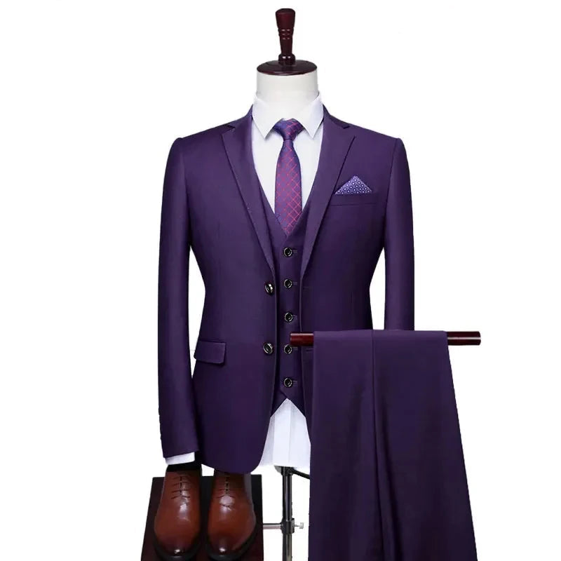Purple suit with tie and handkerchief on a mannequin against a white background