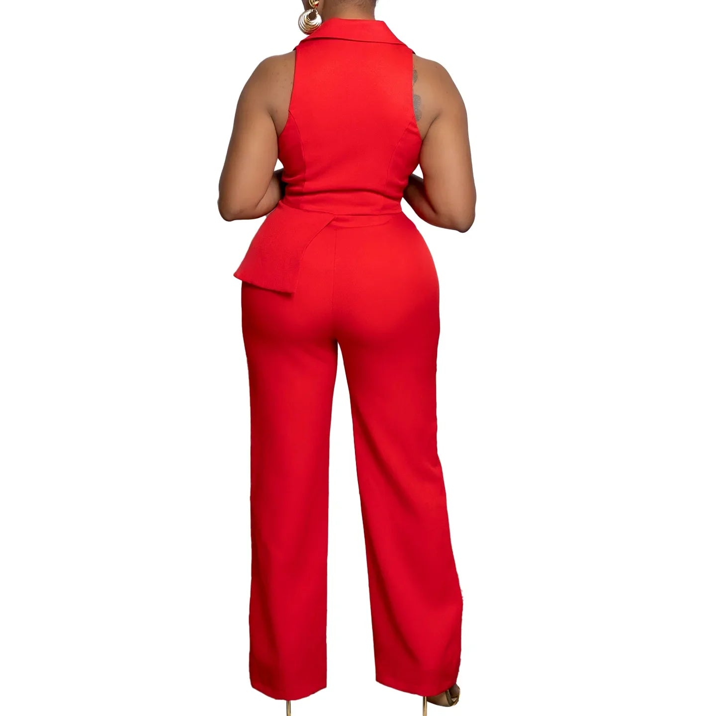 Red jumpsuit worn by a person on a white background