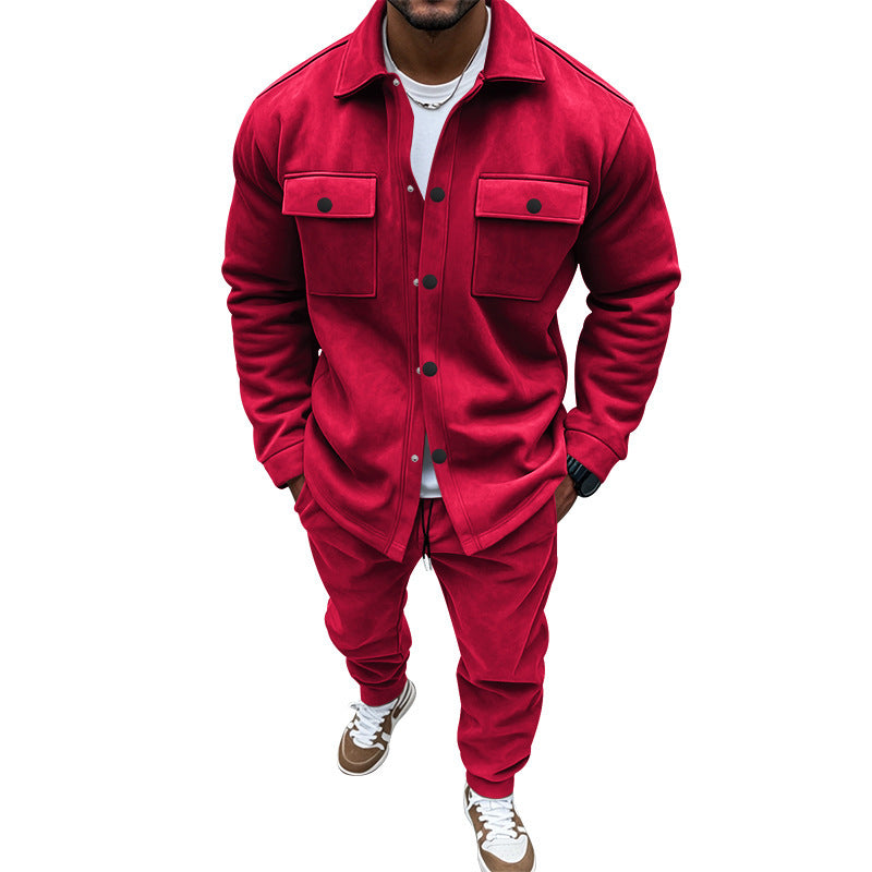 Red tracksuit worn by a person on a white background