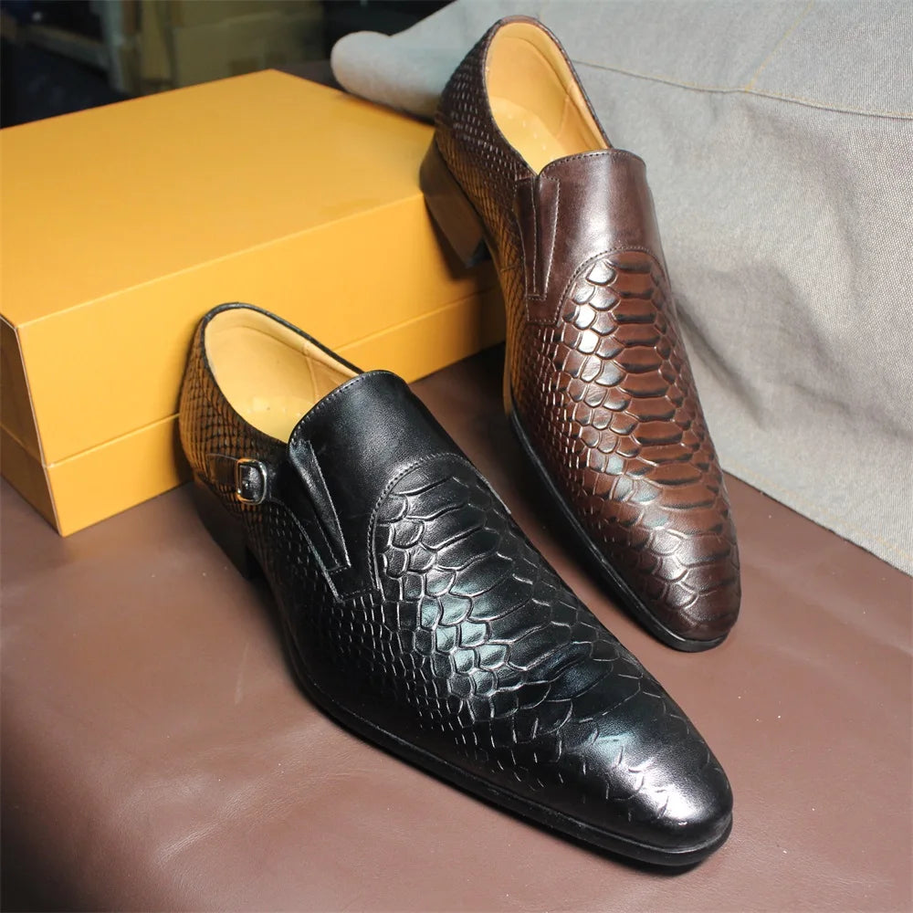 Black and brown men's monk strap loafers displayed with yellow packaging box