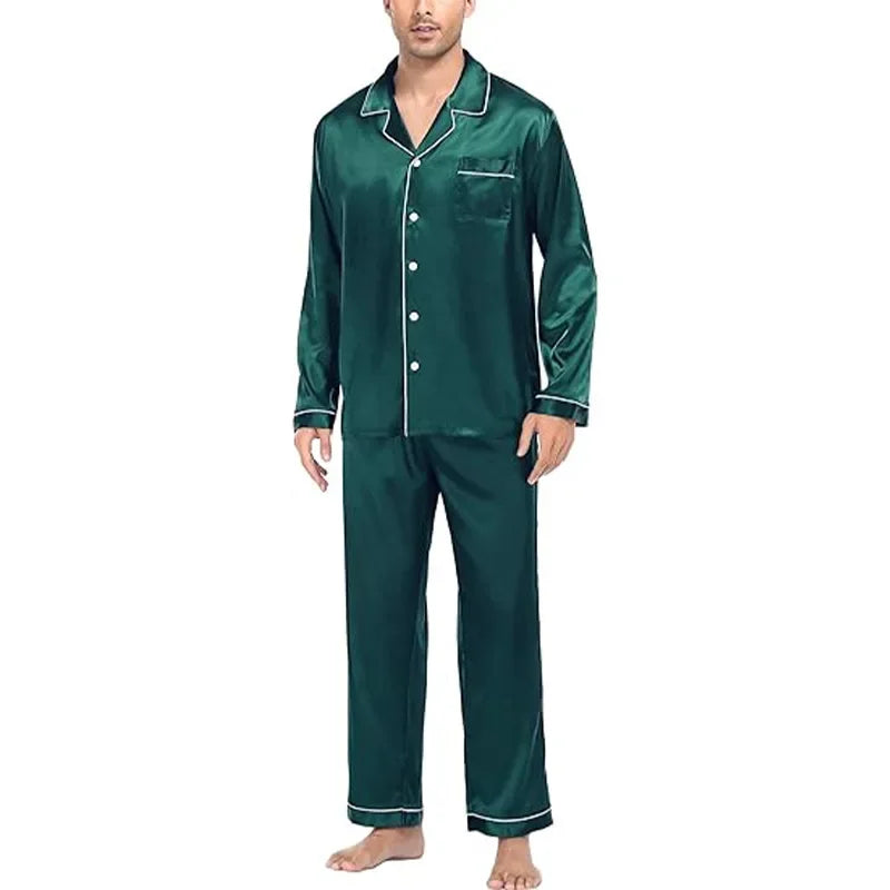 Man wearing green satin pajamas on a white background