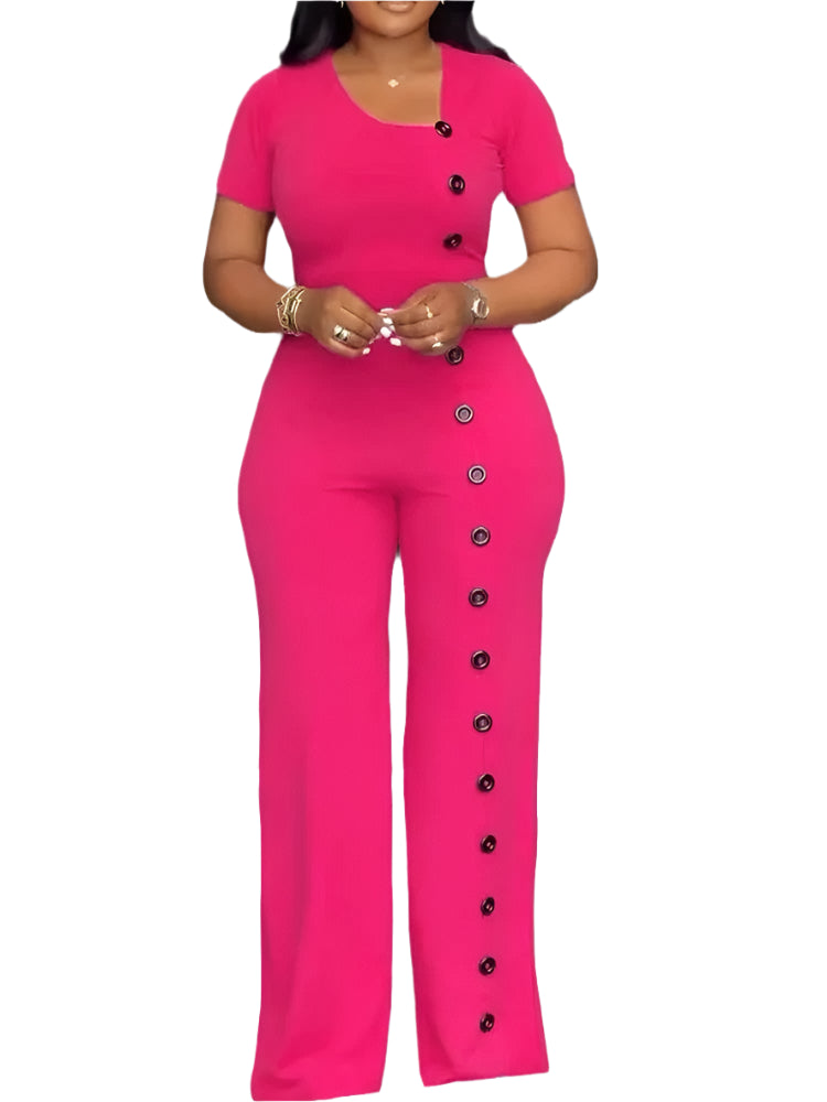 Woman wearing a pink jumpsuit with buttons on a white background