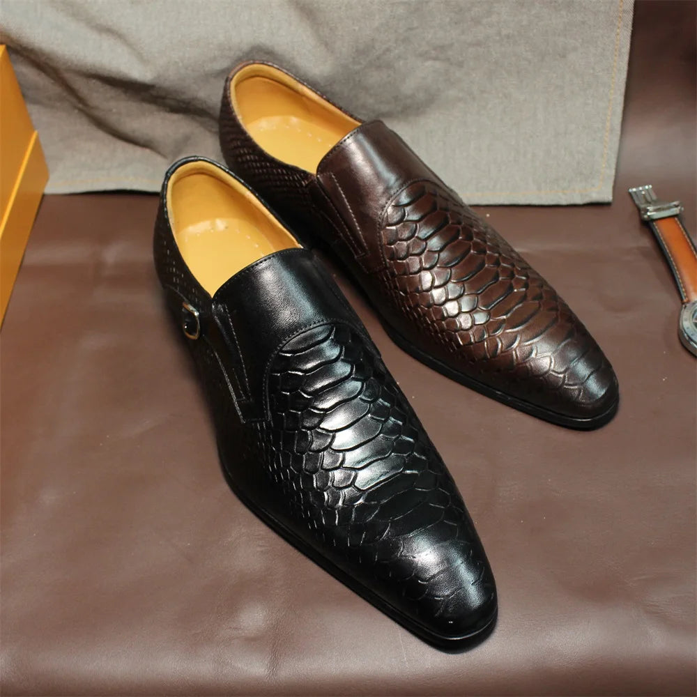 Black and brown men's wingtip loafers with snakeskin texture and monk strap buckle