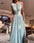 Woman wearing a light blue evening gown in an indoor setting