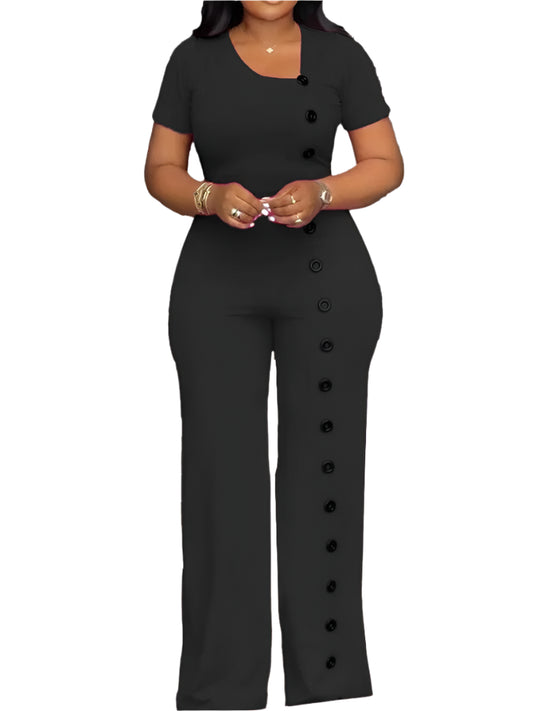 Black button-up jumpsuit worn by a model on a white background