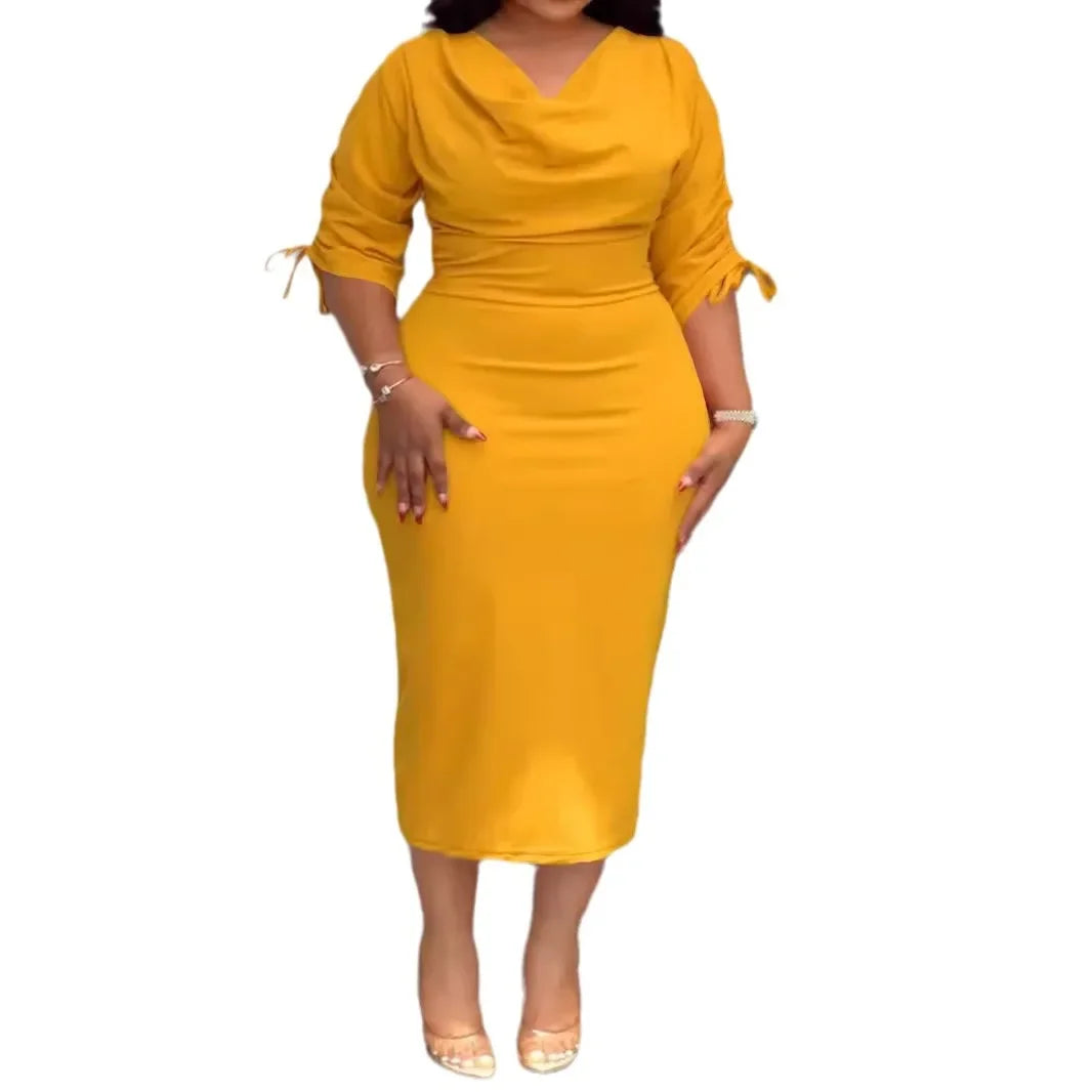 Yellow dress worn by a person on a white background