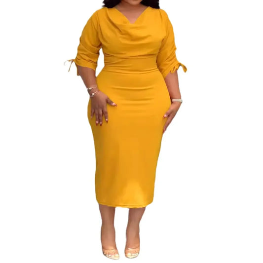 Yellow dress worn by a person on a white background
