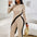 One set of stylish women's polyester jumpsuits with asymmetrical hem