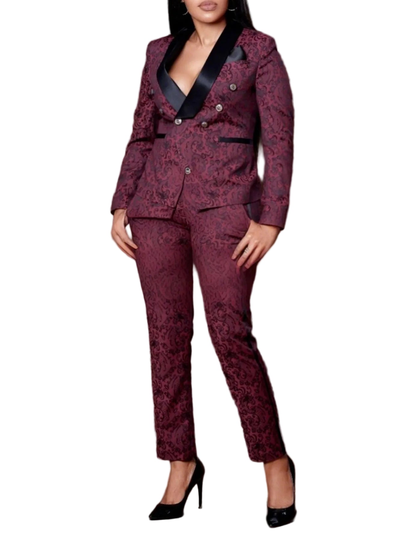 Woman wearing a maroon patterned suit against a brown background